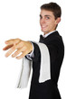 young waiter in uniform welcomes guests in store