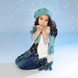 Winter girl Blowing Snow