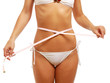 Woman measure her waist belly by metre-stick