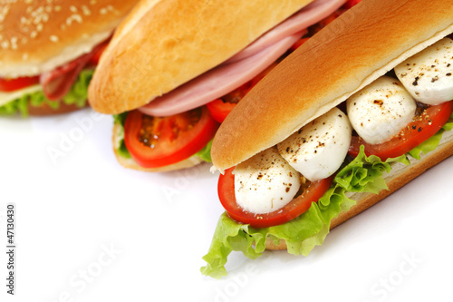 Photo: Sandwich with mozzarella tomato and salad Sandwich with mozzarella tomato and salad