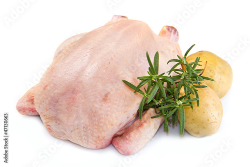 Photo: chicken with potatoes isolated on white background chicken with potatoes isolated on white background
