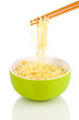 chopsticks holding asian noodles isolated on white