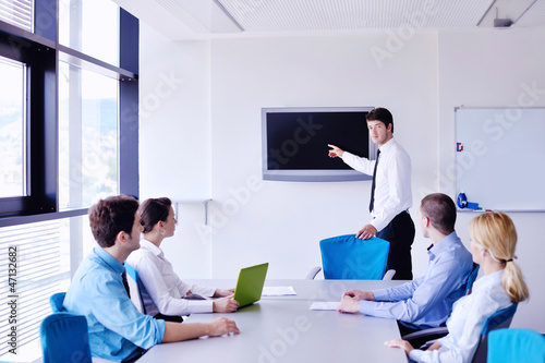 Photo: business people in a meeting at office business people in a meeting at office