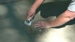 Man Edges and Smooths Out Cement