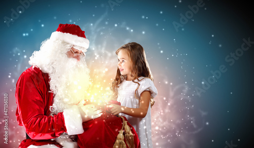 Photo: portrait of santa claus with a girl portrait of santa claus with a girl