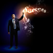 Photo: Businessman with light shining Businessman with light shining
