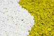 A closeup of colorful white and green stones sand