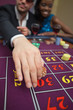 Man placing bet on roulette