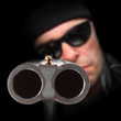 Gangster with shotgun aimed at you. Gun control concept.