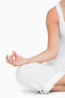 Woman doing yoga while sitting