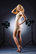 Young attractive woman in photo studio