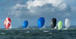 yacht with spinnaker at regatta