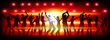 Silhouettes of people dancing