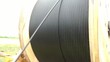 Unreeling Fiber Optic Cable into Hole