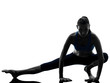 woman exercising yoga stretching legs warm up