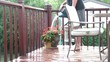 Watering Flowers in the Rain