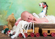 Old toys and newborn baby