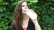 Pretty Woman Drinking Bottled Water