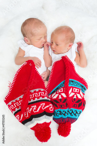 Photo: Twins in red hats Twins in red hats