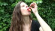 Sexy Woman Eating Cherries