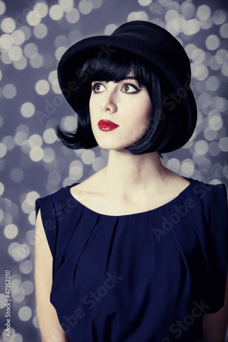 Photo: Portrait of a beautiful girl in hat. Portrait of a beautiful girl in hat.