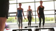 Trainer with his female aerobic group