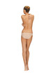 rear view of beautiful topless woman in panties