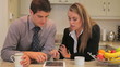 Video: Couple looking at tablet pc and talking Couple looking at tablet pc and talking