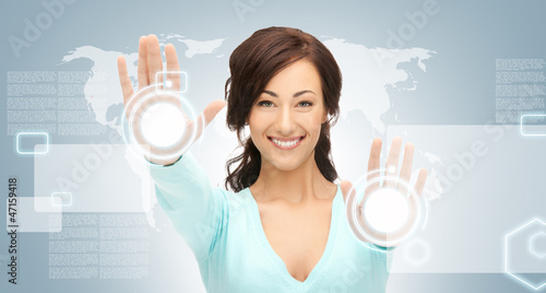 Photo: businesswoman working with touch screen businesswoman working with touch screen