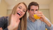 Couple talking and laughing to video chat