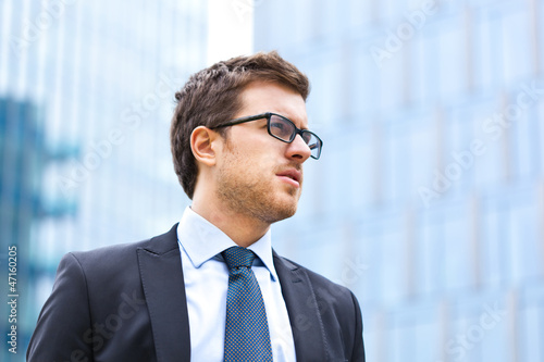 Photo: Portrait of an handsome businessman outdoor Portrait of an handsome businessman outdoor