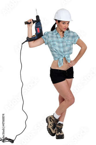 Photo: Woman with drill Woman with drill
