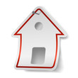 House shaped white label nailed to the wall.