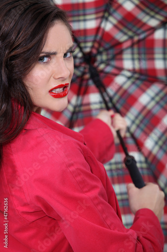 Photo: Beautiful woman with umbrella Beautiful woman with umbrella