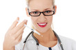 Happy medical doctor or nurse with syringe