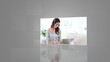 Squares building up to videos on grey background