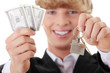 Business man with house keys- real estate