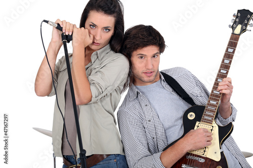 Photo: Couple rocking in a band Couple rocking in a band