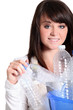 Teenager girl sorting the recycling