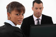 A couple of businesspeople working.