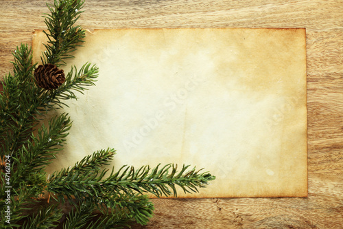 Photo: Blank paper with Christmas decorations Blank paper with Christmas decorations