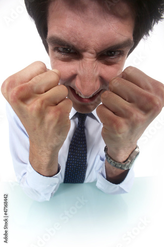 Photo: angry businessman shouting angry businessman shouting