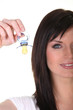 blue-eyed brunette with dummy