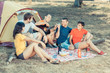 Group of People Camping and Singing