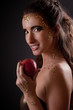Girl in snake image with forbidden fruit
