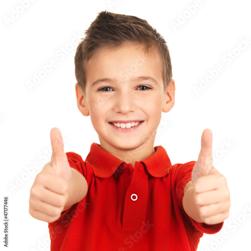 Photo: Portrait of cheerful boy showing thumbs up gesture Portrait of cheerful boy showing thumbs up gesture