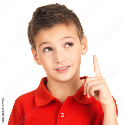 Photo: Portrait of cheerful boy with good idea Portrait of cheerful boy with good idea