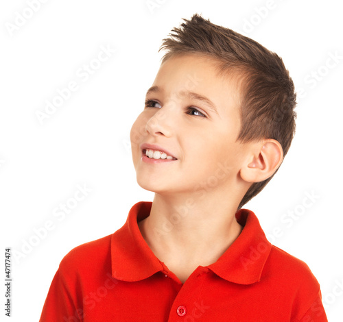 Photo: Pretty young happy boy looking away Pretty young happy boy looking away