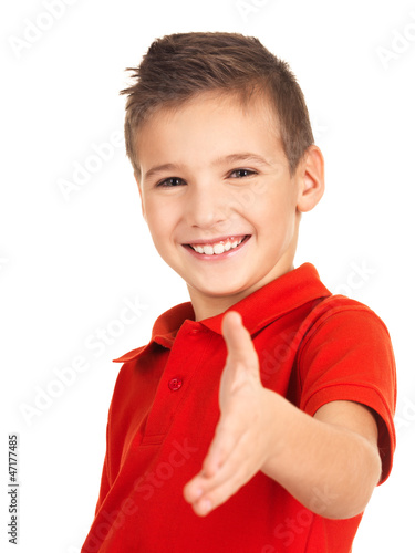 Photo: Portrait of smiling boy showing handshake gesture Portrait of smiling boy showing handshake gesture