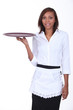 Waitress holding empty tray